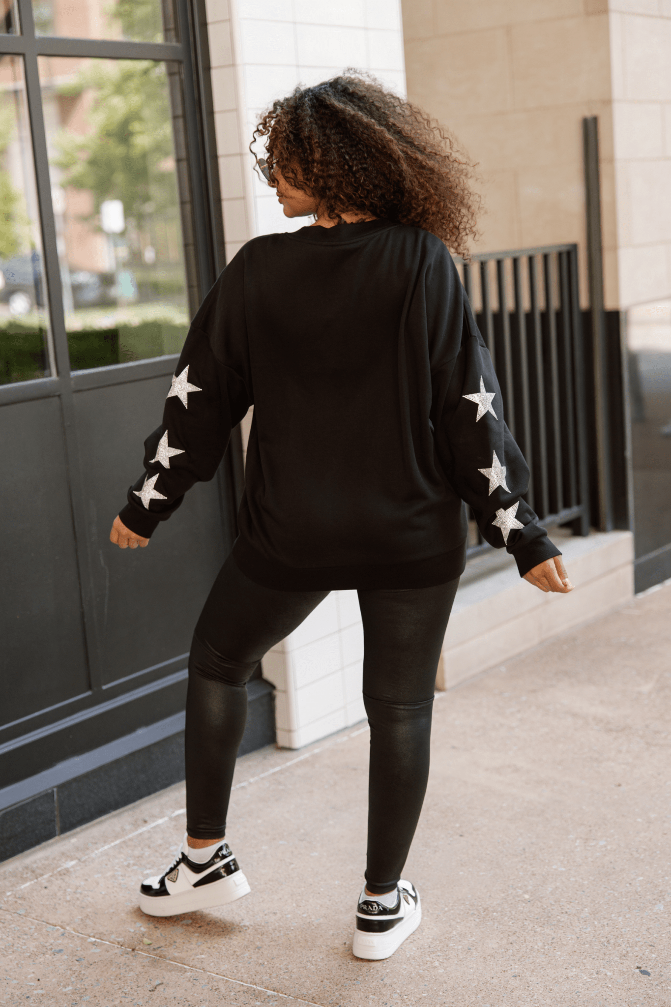 BIXBY WHITE FOOTBALL EMBELLISHED STAR SLEEVE CREWNECK SWEATSHIRT - The Club