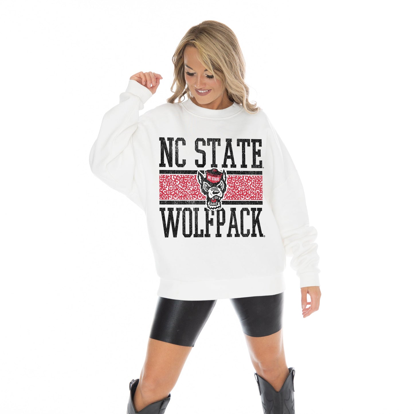 NORTH CAROLINA STATE WOLFPACK FAIR CATCH LONG SLEEVE UNISEX FIT PREMIUM FLEECE CREWNECK SWEATSHIRT WITH RIBBED KNIT NECKLINE, WRIST, AND WAISTBAND