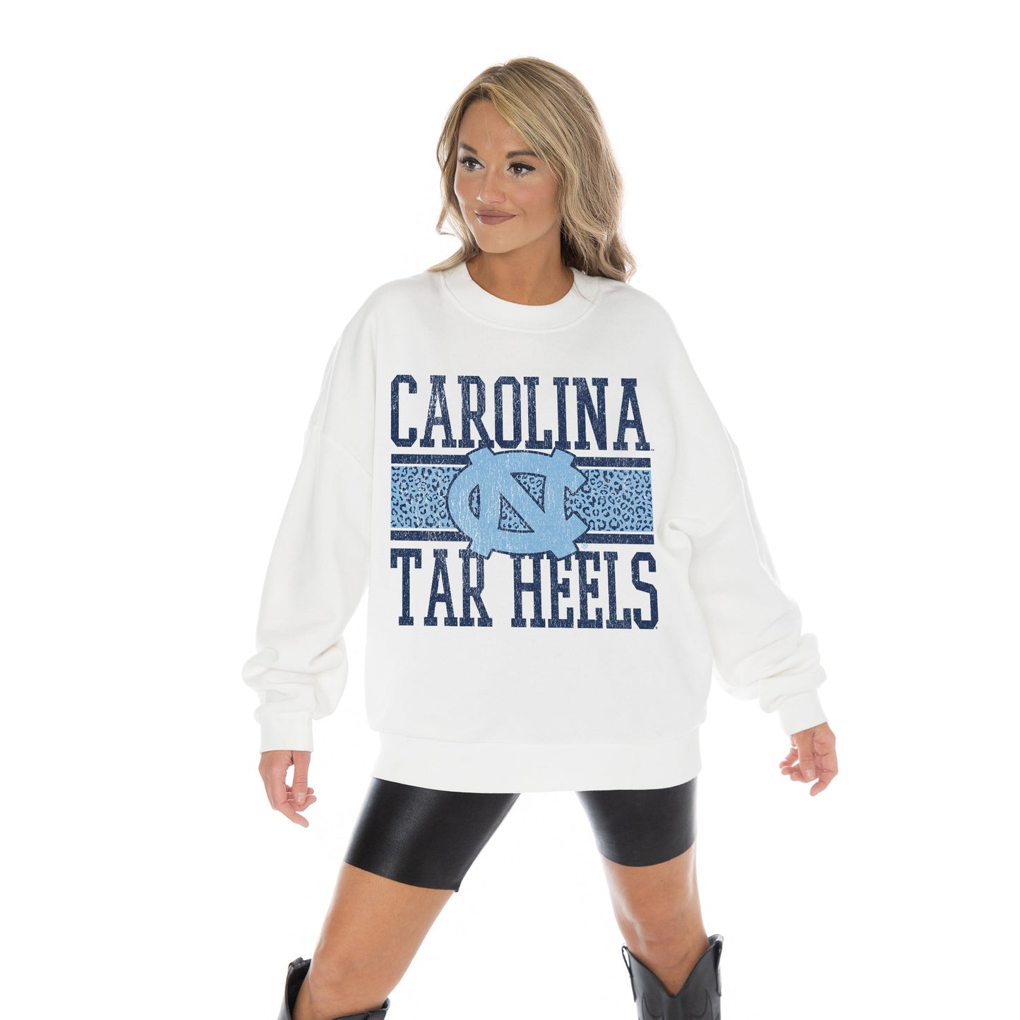NORTH CAROLINA TAR HEELS FAIR CATCH LONG SLEEVE UNISEX FIT PREMIUM FLEECE CREWNECK SWEATSHIRT WITH RIBBED KNIT NECKLINE, WRIST, AND WAISTBAND