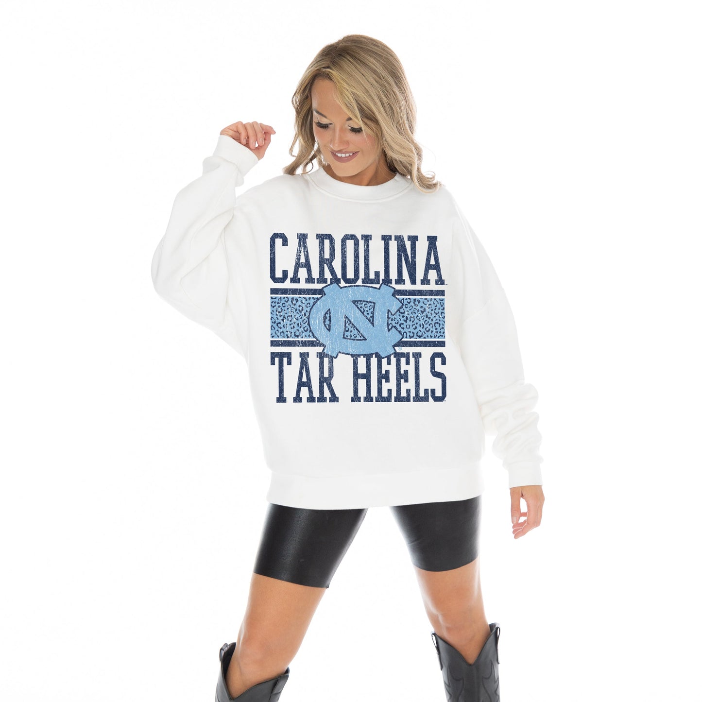 NORTH CAROLINA TAR HEELS FAIR CATCH LONG SLEEVE UNISEX FIT PREMIUM FLEECE CREWNECK SWEATSHIRT WITH RIBBED KNIT NECKLINE, WRIST, AND WAISTBAND
