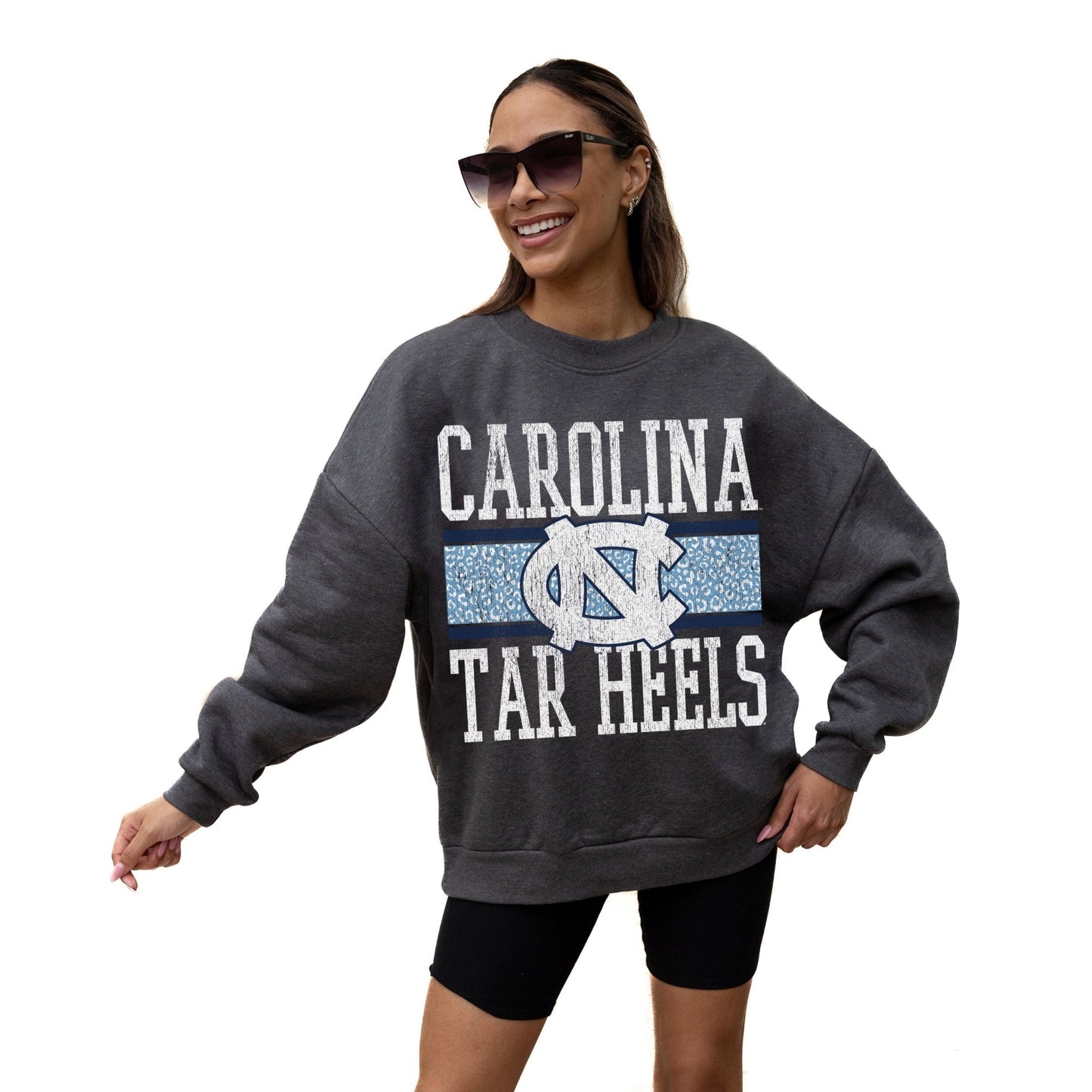 NORTH CAROLINA TAR HEELS WILD TAILGATE LONG SLEEVE UNISEX FIT PREMIUM FLEECE CREWNECK SWEATSHIRT WITH RIBBED KNIT NECKLINE, WRIST, AND WAISTBAND - The Club