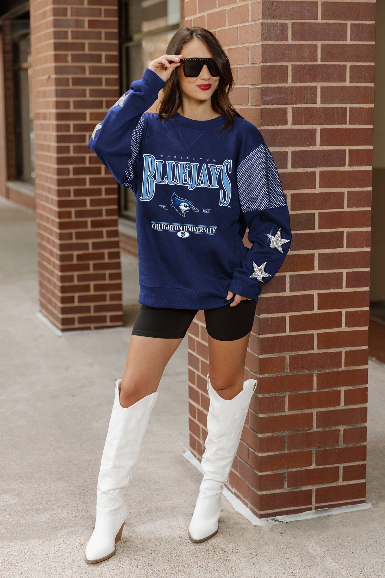CREIGHTON BLUEJAYS SHINING SPIRIT CREWNECK FLEECE PULLOVER WITH CONTRASTING JERSEY MESH SHOULDER INSERTS, RHINESTUD STARS, AND RIBBED CUFFS AND WAISTBAND