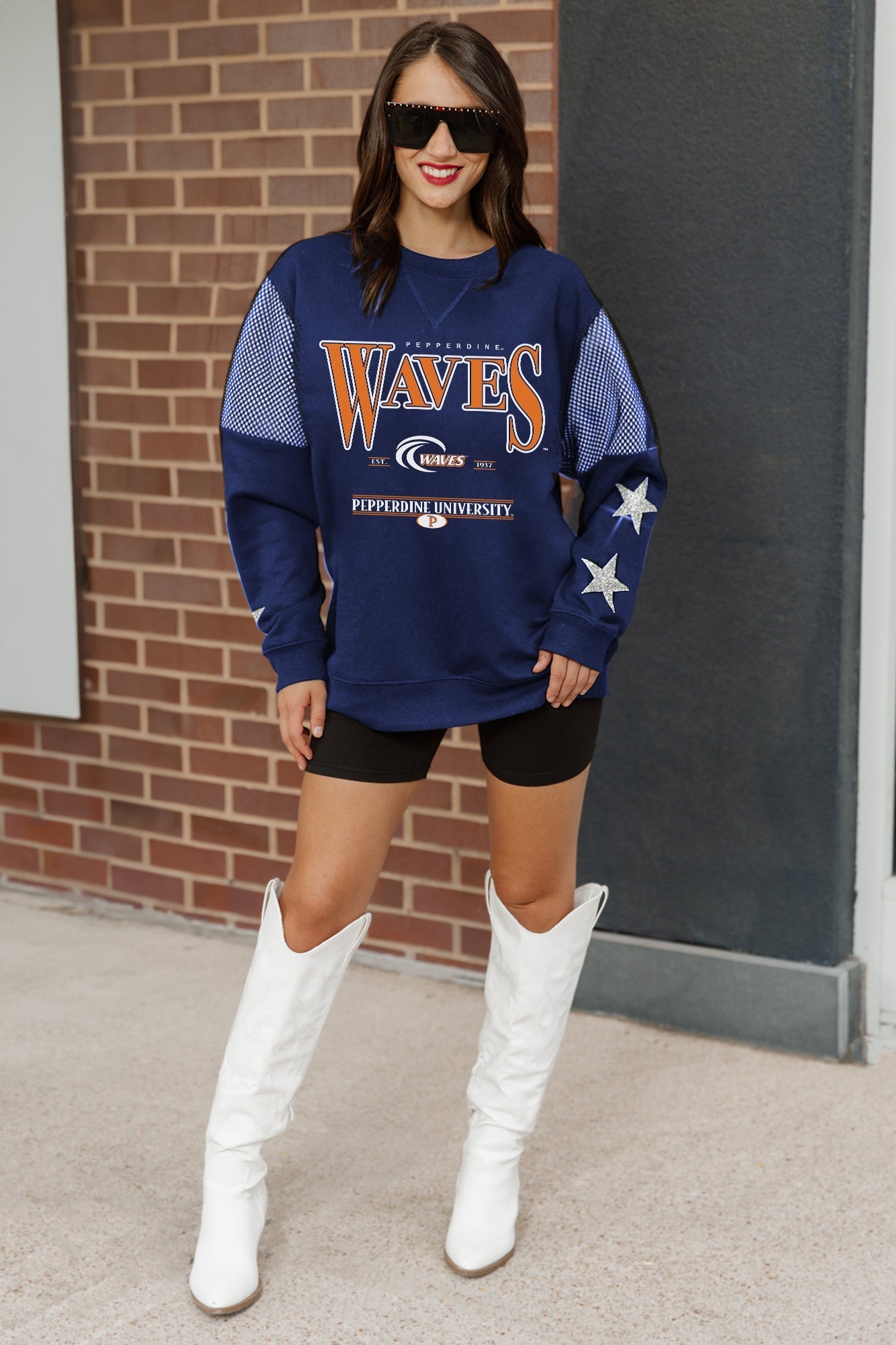 PEPPERDINE WAVES SHINING SPIRIT CREWNECK FLEECE PULLOVER WITH CONTRASTING JERSEY MESH SHOULDER INSERTS, RHINESTUD STARS, AND RIBBED CUFFS AND WAISTBAND