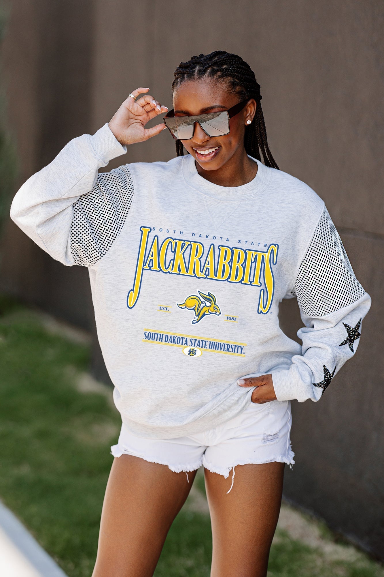 SOUTH DAKOTA STATE JACKRABBITS SHINING SPIRIT CREWNECK FLEECE PULLOVER WITH CONTRASTING JERSEY MESH SHOULDER INSERTS, RHINESTUD STARS, AND RIBBED CUFFS AND WAISTBAND