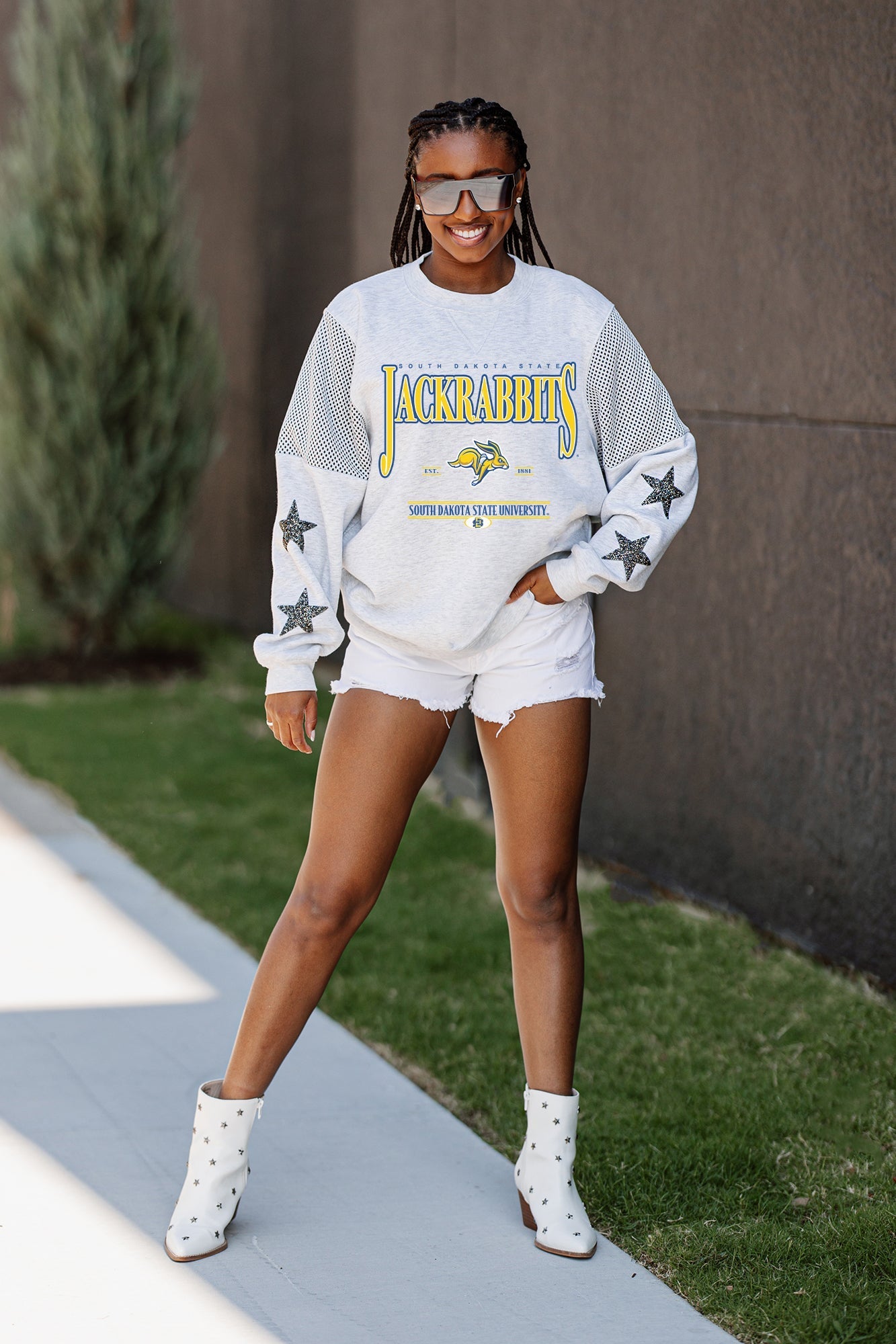 SOUTH DAKOTA STATE JACKRABBITS SHINING SPIRIT CREWNECK FLEECE PULLOVER WITH CONTRASTING JERSEY MESH SHOULDER INSERTS, RHINESTUD STARS, AND RIBBED CUFFS AND WAISTBAND