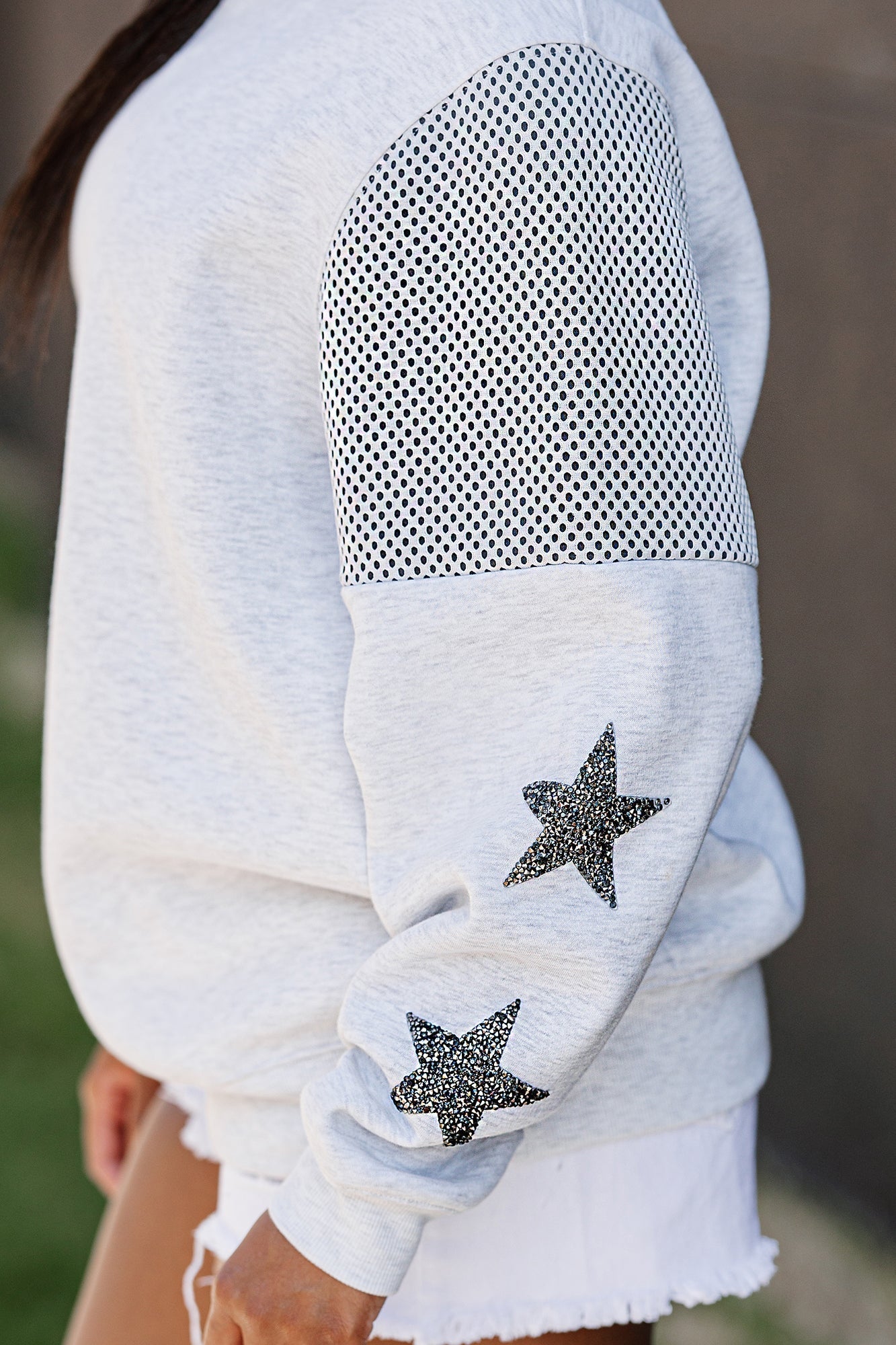 SOUTH DAKOTA STATE JACKRABBITS SHINING SPIRIT CREWNECK FLEECE PULLOVER WITH CONTRASTING JERSEY MESH SHOULDER INSERTS, RHINESTUD STARS, AND RIBBED CUFFS AND WAISTBAND