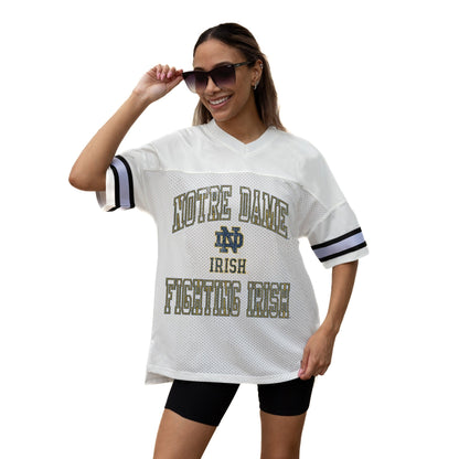 NOTRE DAME FIGHTING IRISH A STEP AHEAD ICONIC OVERSIZED MESH SHORT SLEEVE V - NECK FASHION JERSEY TOP WITH SIDE SLITS - The Club