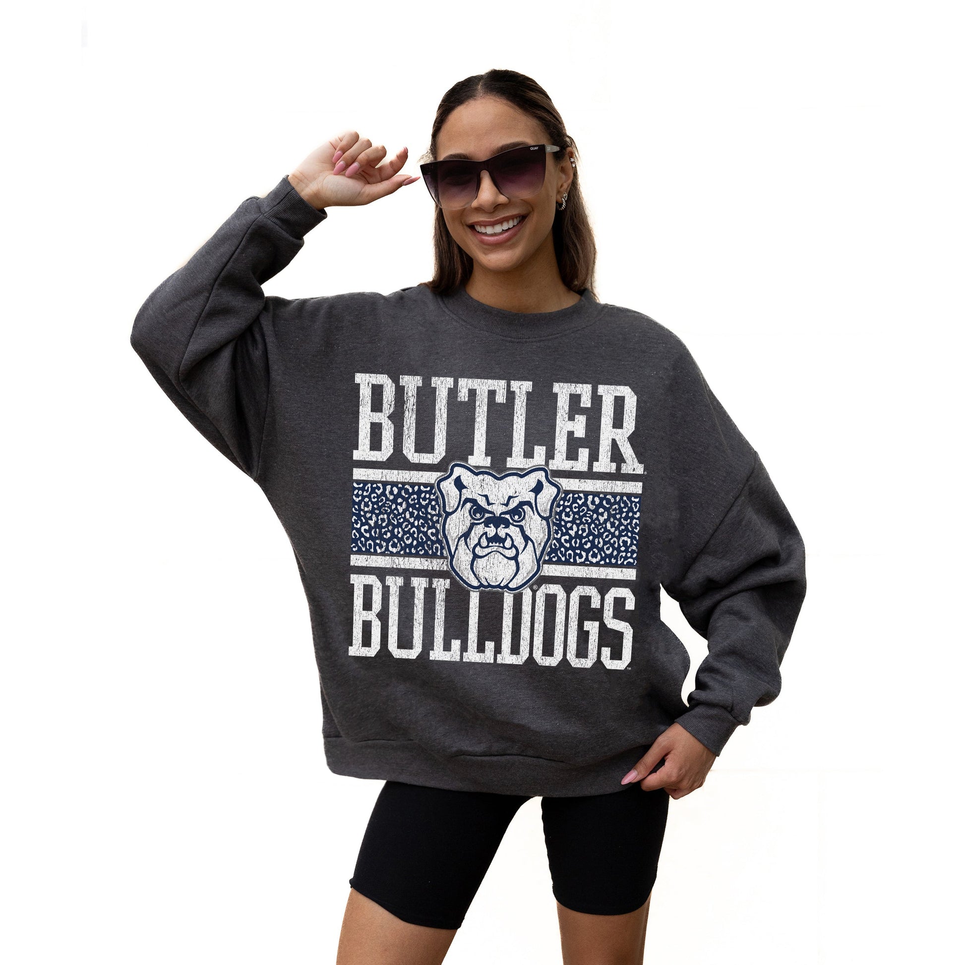 BUTLER BULLDOGS WILD TAILGATE LONG SLEEVE UNISEX FIT PREMIUM FLEECE CREWNECK SWEATSHIRT WITH RIBBED KNIT NECKLINE, WRIST, AND WAISTBAND