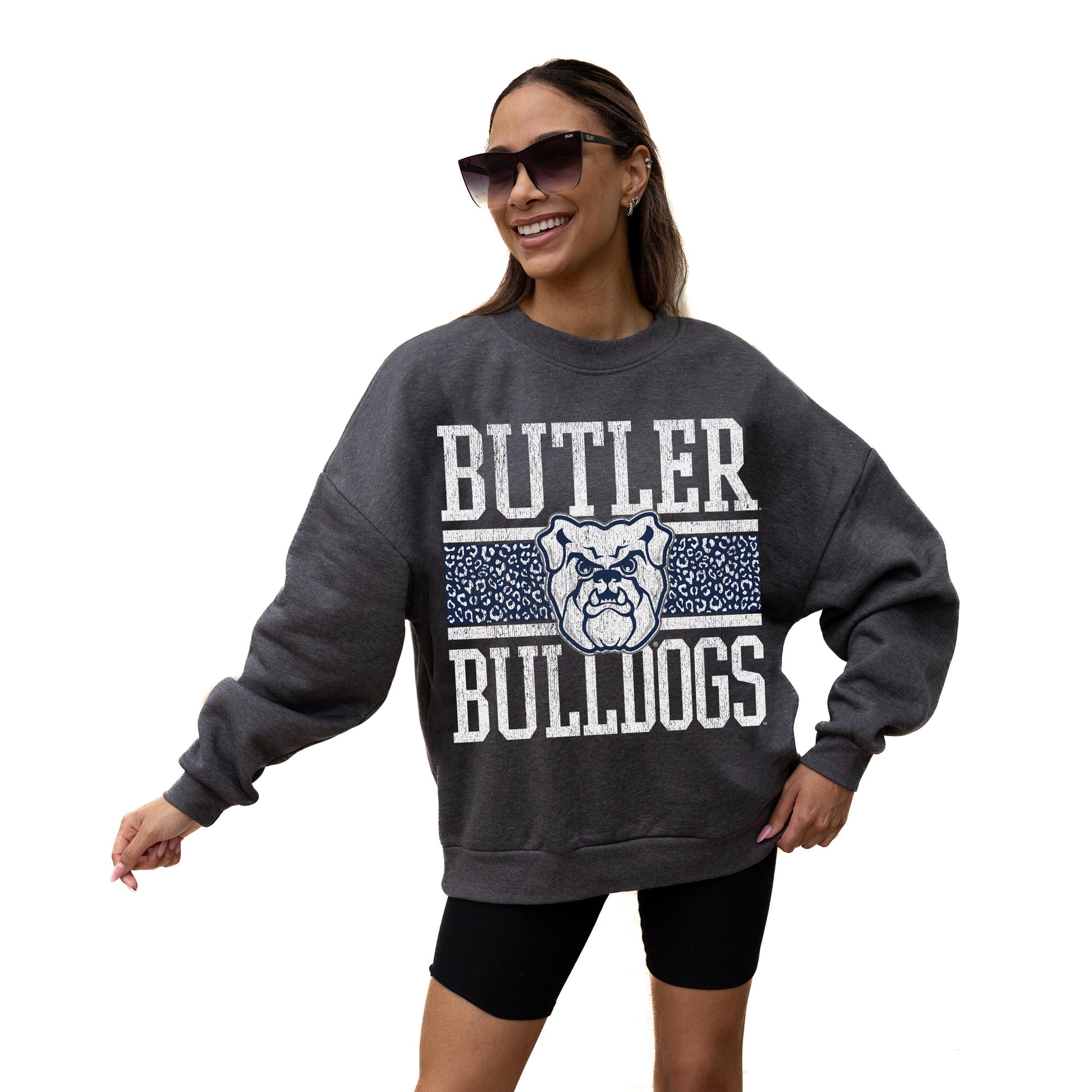 BUTLER BULLDOGS WILD TAILGATE LONG SLEEVE UNISEX FIT PREMIUM FLEECE CREWNECK SWEATSHIRT WITH RIBBED KNIT NECKLINE, WRIST, AND WAISTBAND