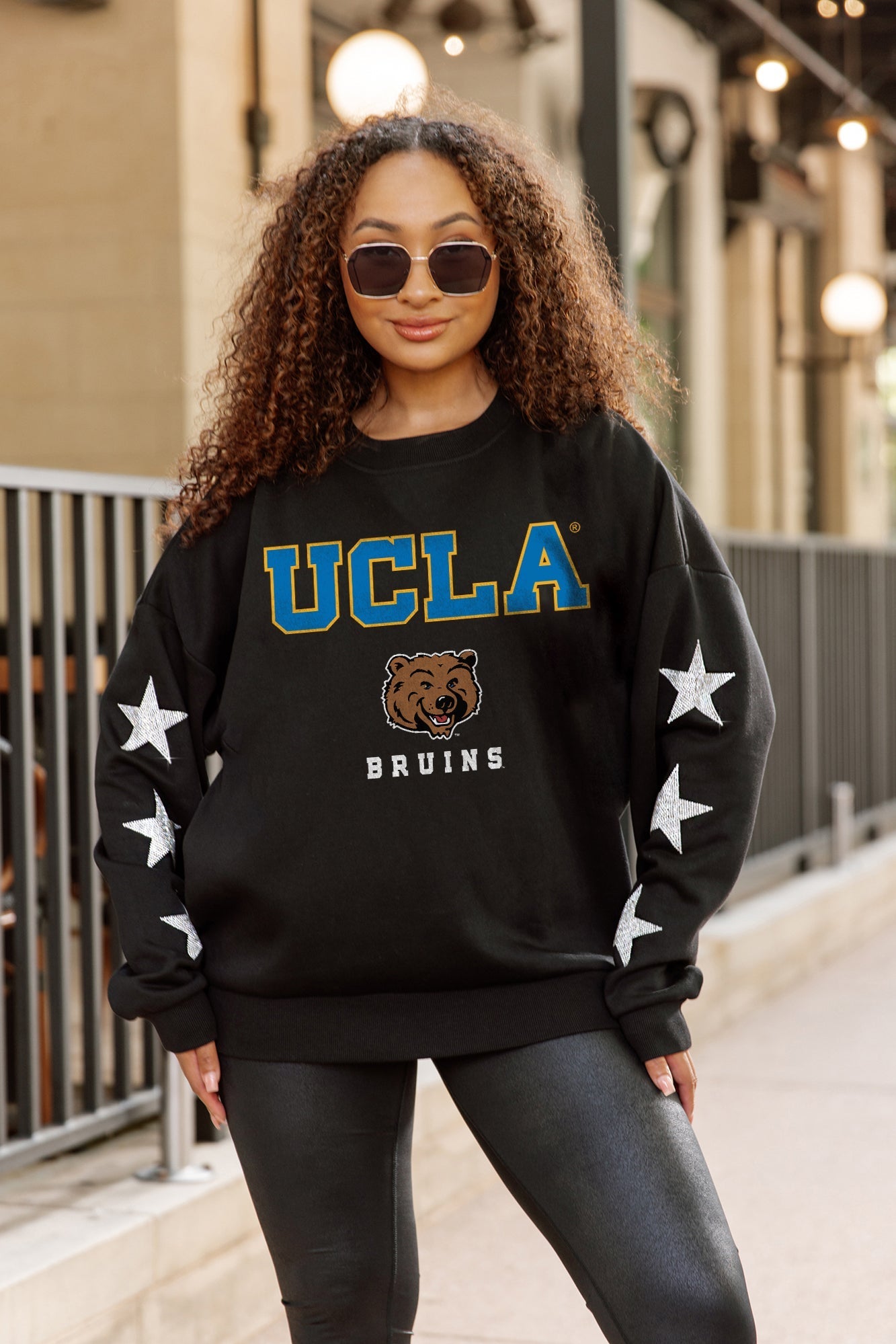 UCLA BRUINS VELOCITY STAR EMBELLISHED CREW SWEATSHIRT
