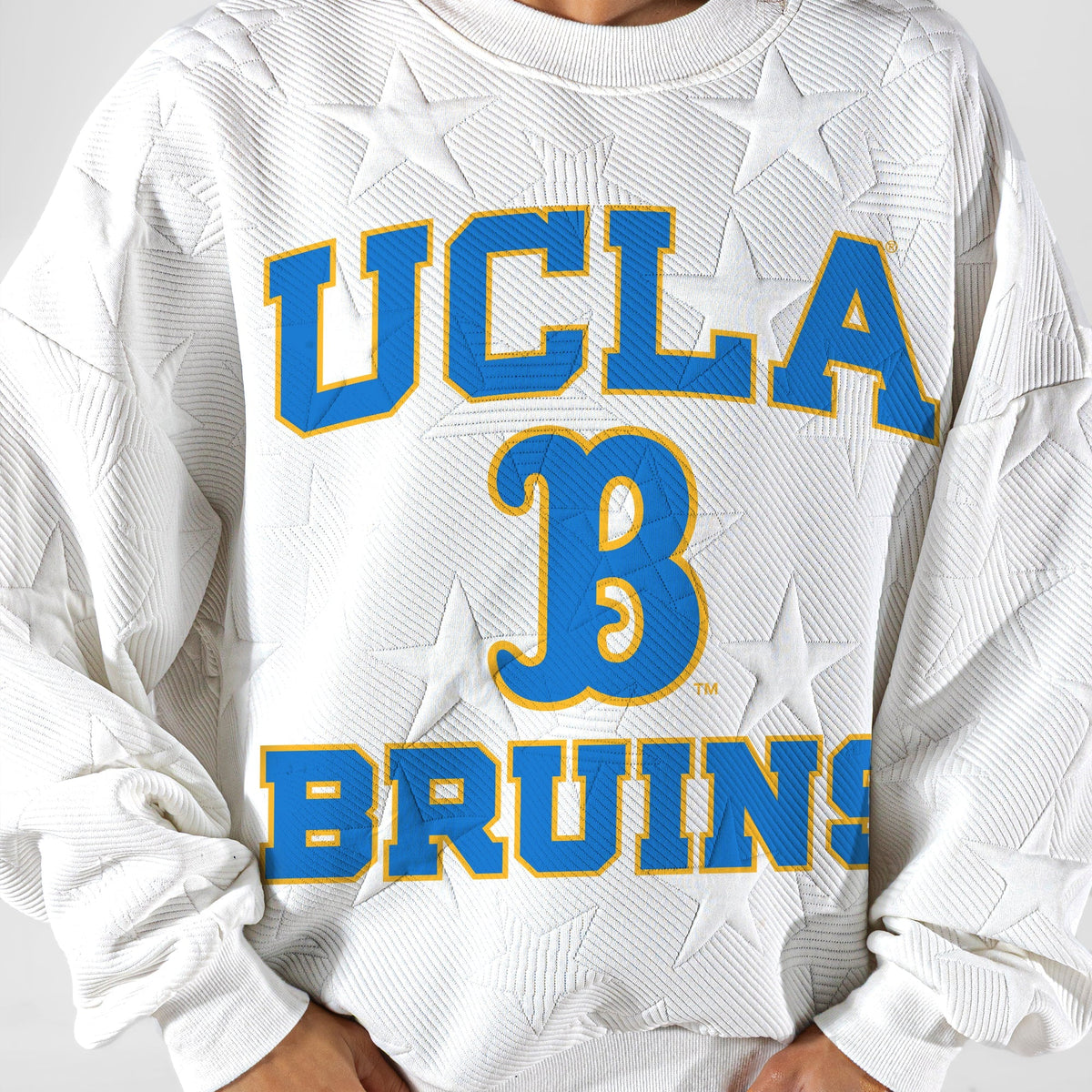 UCLA BRUINS BIG PLAY ENERGY EMBOSSED STAR CREWNECK