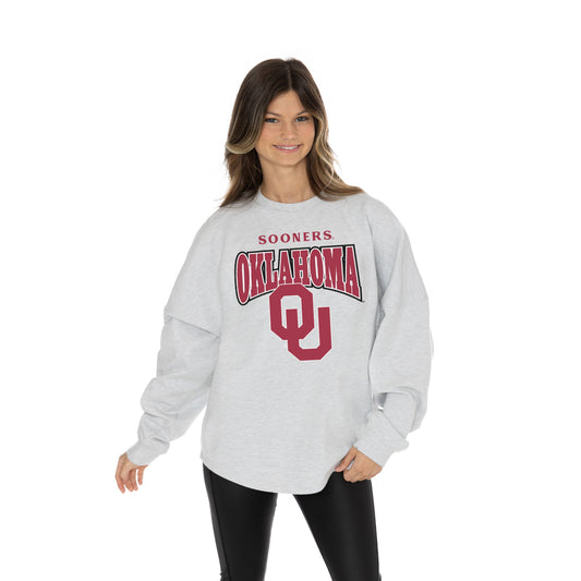 OKLAHOMA SOONERS FIGHTING SPIRIT RELAXED FIT HEATHERED LONG SLEEVE FRENCH TERRY PULLOVER WITH RIBBED CUFF AND NECKLINE DETAIL